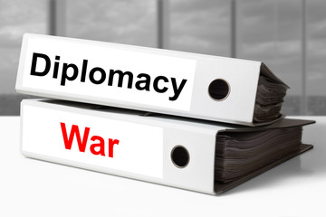 stack of office binders diplomacy war