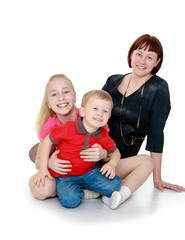 mom laughing together with their children