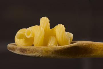 Pasta on a wooden spoon