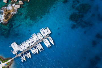 Fototapeta premium Amazing view to Yachts in harbor - Drone view. birds eye angle