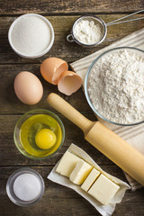 Ingredients for baking on the old wooden table