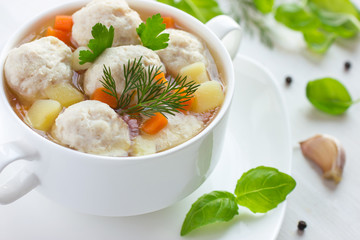Soup with chicken meatballs and vegetables