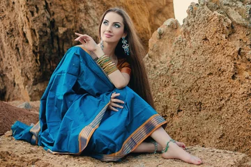 Fotobehang Beautiful girl in traditional Indian sari © smoskvitin