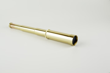 Gold color Spyglass on white background