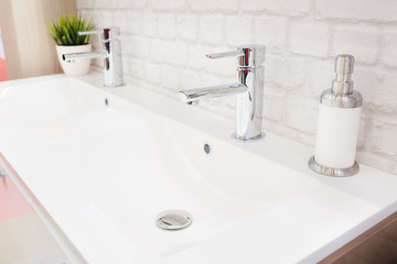 Closeup of a wash basin in a modern bathroom