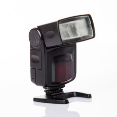 Photo camera flash isolated on white