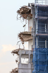 Ruins of building under destruction, urban scene.