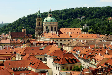 Fototapeta na wymiar Houses with traditional red roofs in Prague