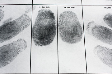 Fingerprint on police fingerprint card.