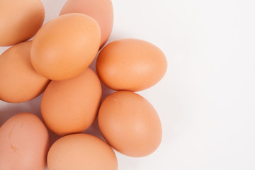 Chicken eggs  on white paper background