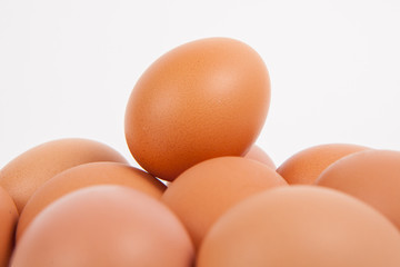 Chicken eggs  on white paper background
