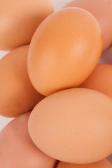 Chicken eggs  on white paper background