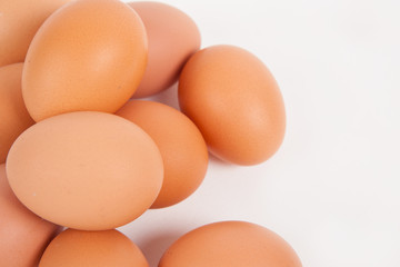 Chicken eggs  on white paper background