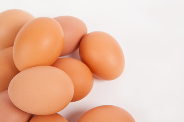 Chicken eggs  on white paper background