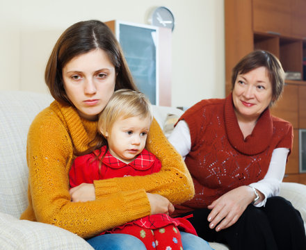  Sad Mother With Baby And Mature Grandmother