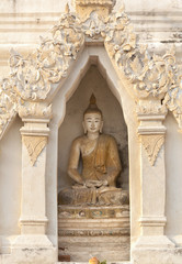 Buddha sculpture inside pagoda