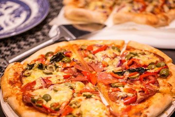 Homemade pizza on white table