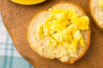 Tapas with boiled egg yolk and garlic