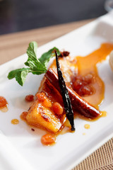 Grilled pineapple cooked in syrup