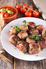 fried meatball and tomato sauce