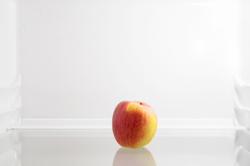 Fresh apple in fridge