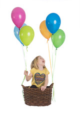 Obraz na płótnie Canvas cheerful kid on hot air balloon