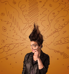 Excited young woman with extreme hairtsyle and hand drawn lines