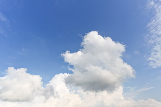 nature background. white clouds over blue sky soft focus.