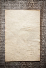 paper on wooden background