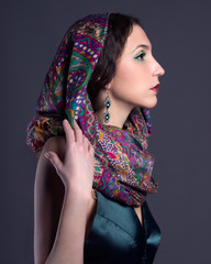 beautiful young brunette woman in scarf
