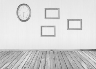 interior with frames and clock