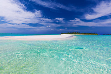 Sand bar at the end of tropical island with pristine water
