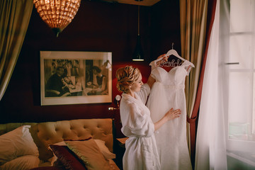 morning bride in hotel room