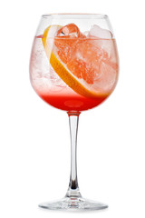Full glass of fresh cool tonic with grapefruits juice and slices