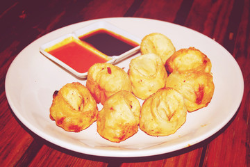 Fried chicken dumplings - vintage effect.