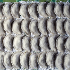 Cooking ukrainian varenyky with cherries