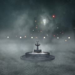 Fountain in a foggy city