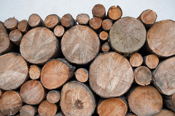 mosaic round wood at a white wall