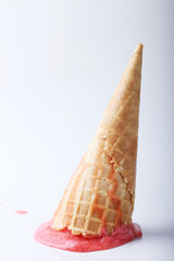 red strawberry ice cream cone dropped melt