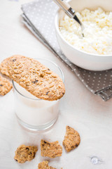 Healthy breakfast with cottage cheese, grain cookies, milk