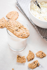 Healthy breakfast with cottage cheese, grain cookies, milk