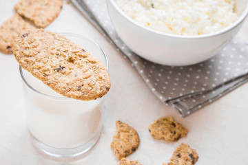 Healthy breakfast with cottage cheese, grain cookies, milk