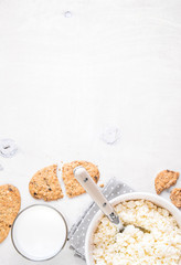 Healthy breakfast with cottage cheese, grain cookies, milk