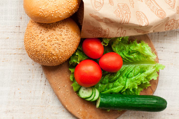 Hamburger ingredients on table