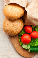 Hamburger ingredients on table