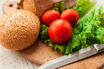 Hamburger ingredients on table