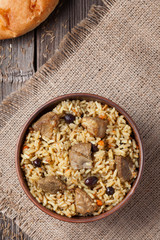 Pilaf is spicy indian food cooked with lot of rice, fried meat