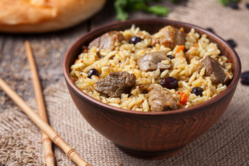 Traditional asian gourmet meal called pilaf cooked with rice