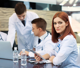 Fototapeta premium Medical workers working in conference room