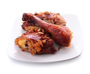 Roasted chicken on white plate
